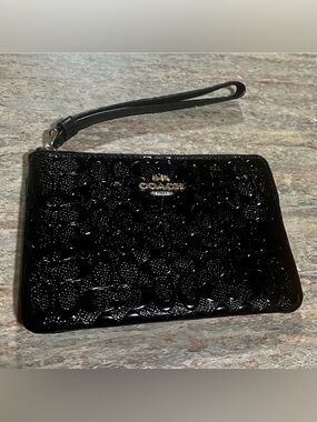 NWOT Coach black glossy wristlet